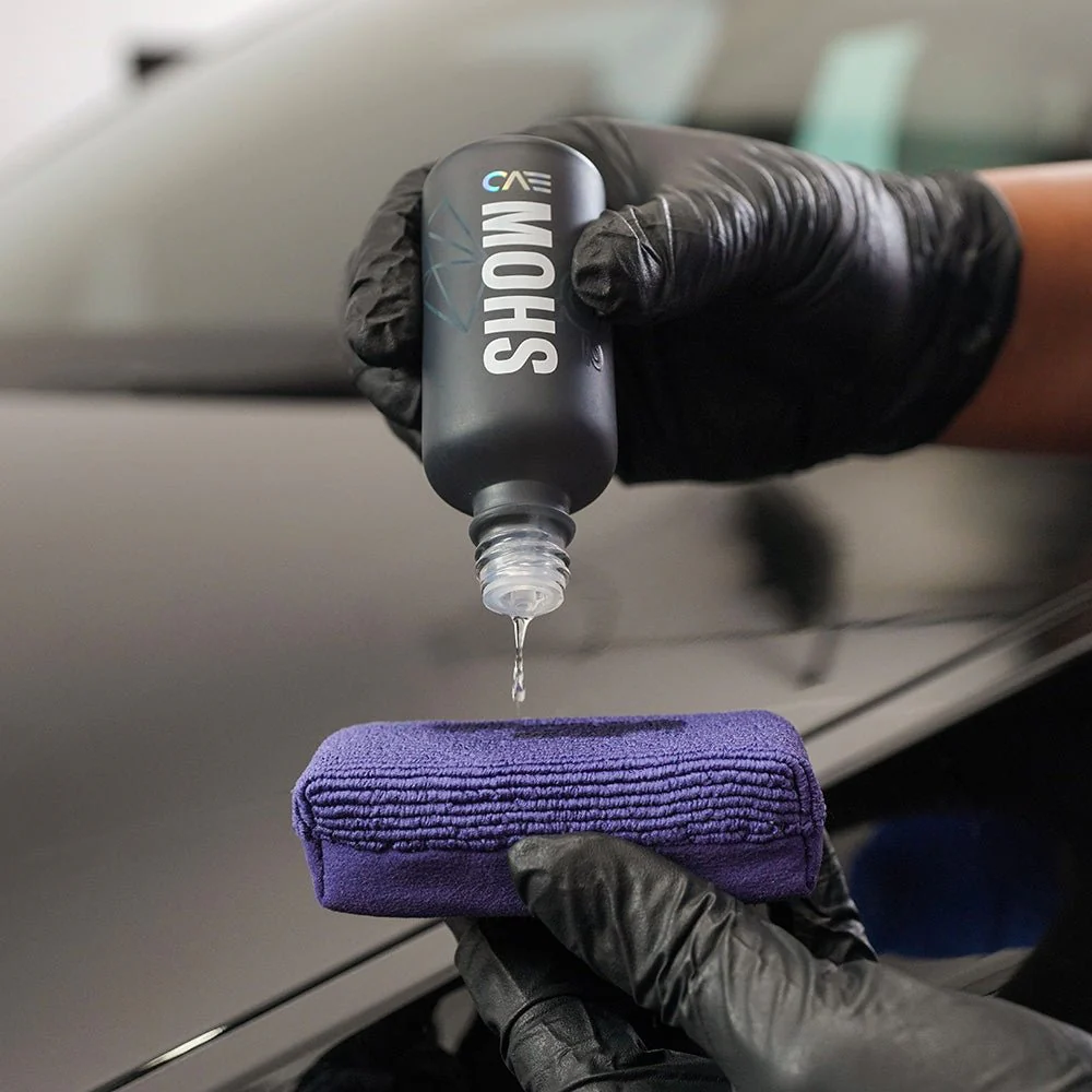 Applying genuine GYEON ceramic coating during a Speca Detailing paint correction service